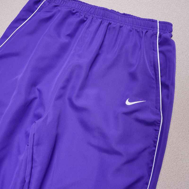 Conjunto Supreme x Nike Track Roxo